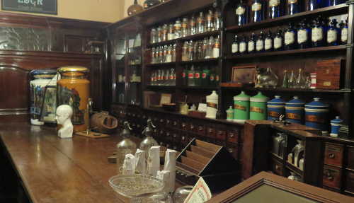 Interior of 19th century chemist's shop picture of chemist's shop